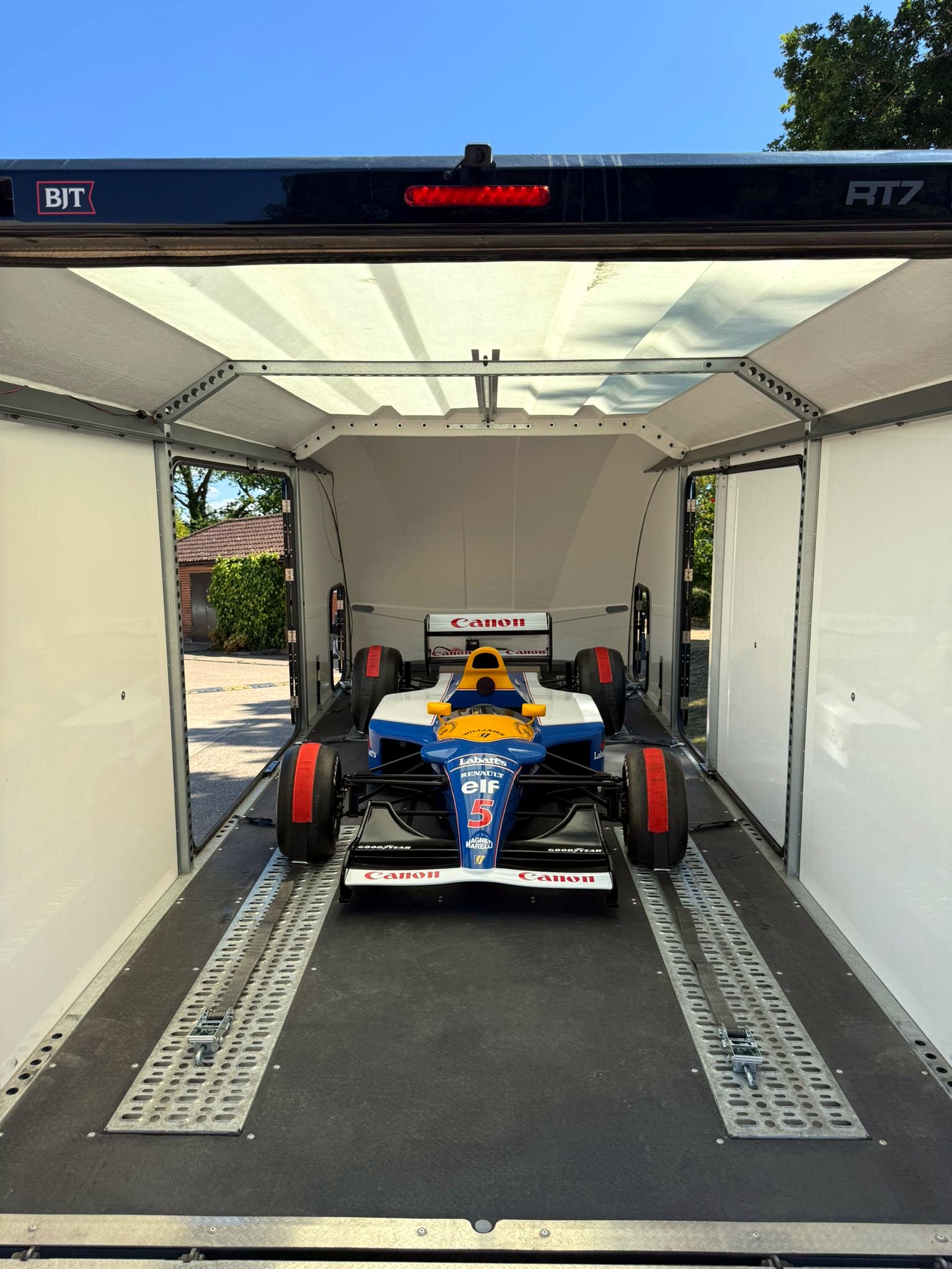 Williams-Renault Formula 1 car loaded inside the DMT enclosed transporter